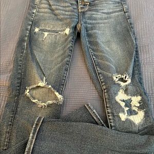 American eagle ripped, button fl, dark wash jeans size 4 regular.